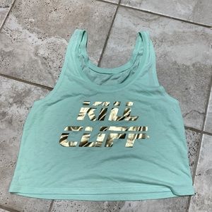 Kill cliff women’s tank size small. Mint color with gold